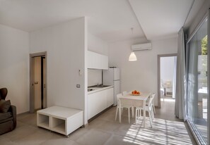 Junior Suite, Patio | Private kitchen