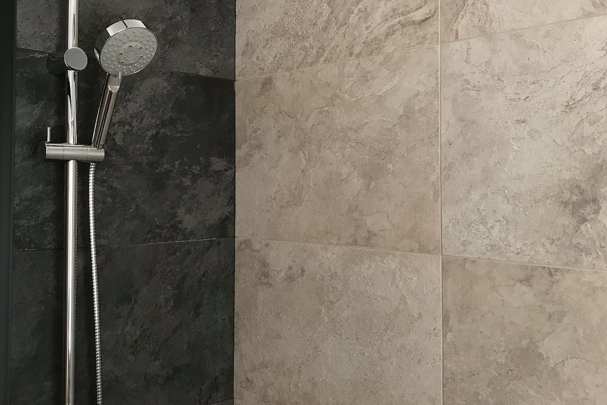 deluxe suite, 1 bedroom, terrace | bathroom | shower, free toiletries, hair dryer, towels