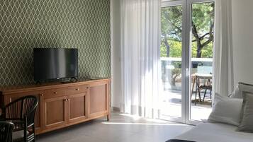 Deluxe suite, 1 slaapkamer, terras | Woonruimte