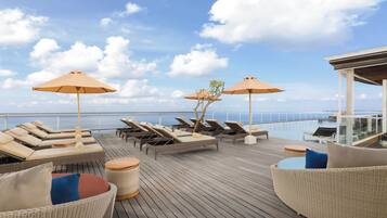 Outdoor pool, pool umbrellas, pool loungers