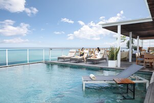 Outdoor pool, pool umbrellas, pool loungers