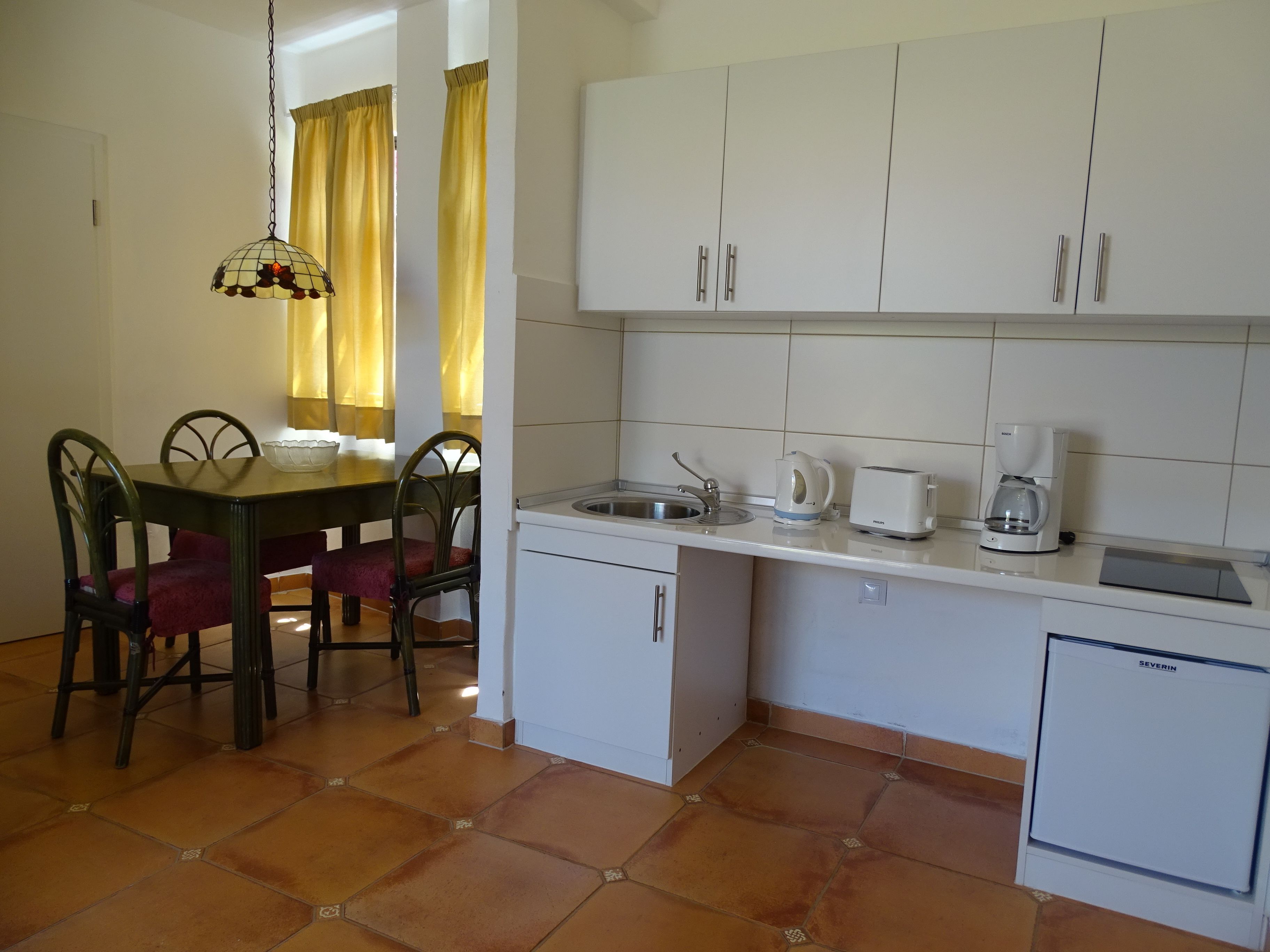 bungalow, 1 bedroom | private kitchen | fridge, stovetop, toaster, cookware/dishes/utensils