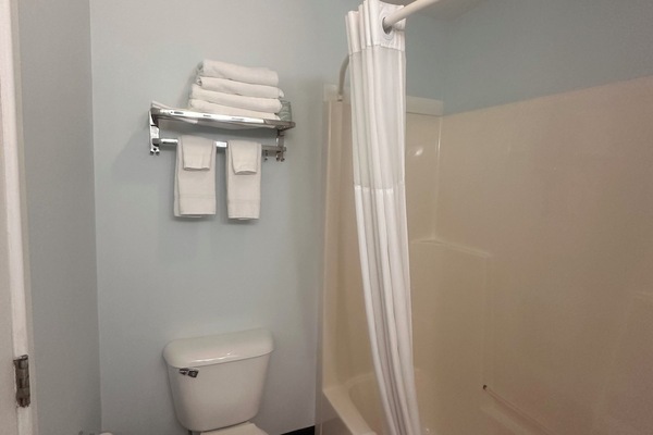 Suite, Multiple Beds, Fireplace (King Fireplace Suite) | Bathroom | Free toiletries, hair dryer, towels, soap