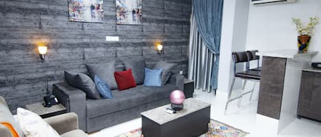 Presidential Apartment | Living area | 40-inch plasma TV with satellite channels, TV