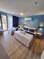 Deluxe Quadruple Room | Individually furnished, soundproofing, free WiFi, bed sheets