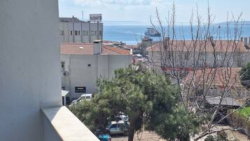 Deluxe Quadruple Room | Balcony