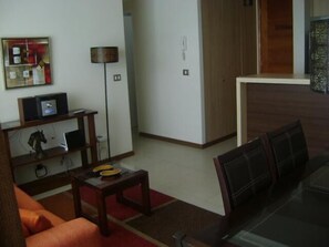Family Apartment, 2 Bedrooms, Balcony, Garden View | Living room | Flat-screen TV, DVD player - Departamento Laguna Mar 7 (La Serena)
