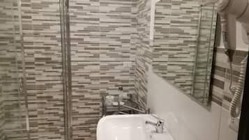 Regadera, amenidades de baño gratuitas, secadora de cabello, bidet
