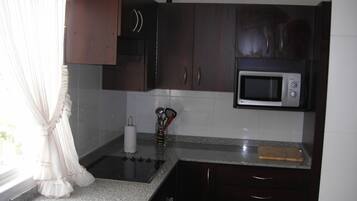 Family Apartment, 2 Bedrooms, Balcony, Ocean View | Private kitchen | Full-size fridge, microwave, oven, stovetop