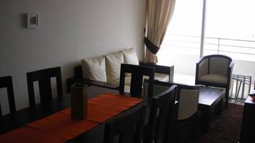 Family Apartment, 2 Bedrooms, Balcony, Ocean View | Living area | TV, DVD player