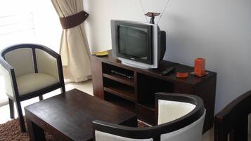 Family Apartment, 2 Bedrooms, Balcony, Ocean View | Living area | TV, DVD player