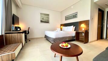 Junior Suite, 1 Queen Bed | Premium bedding, in-room safe, desk, laptop workspace
