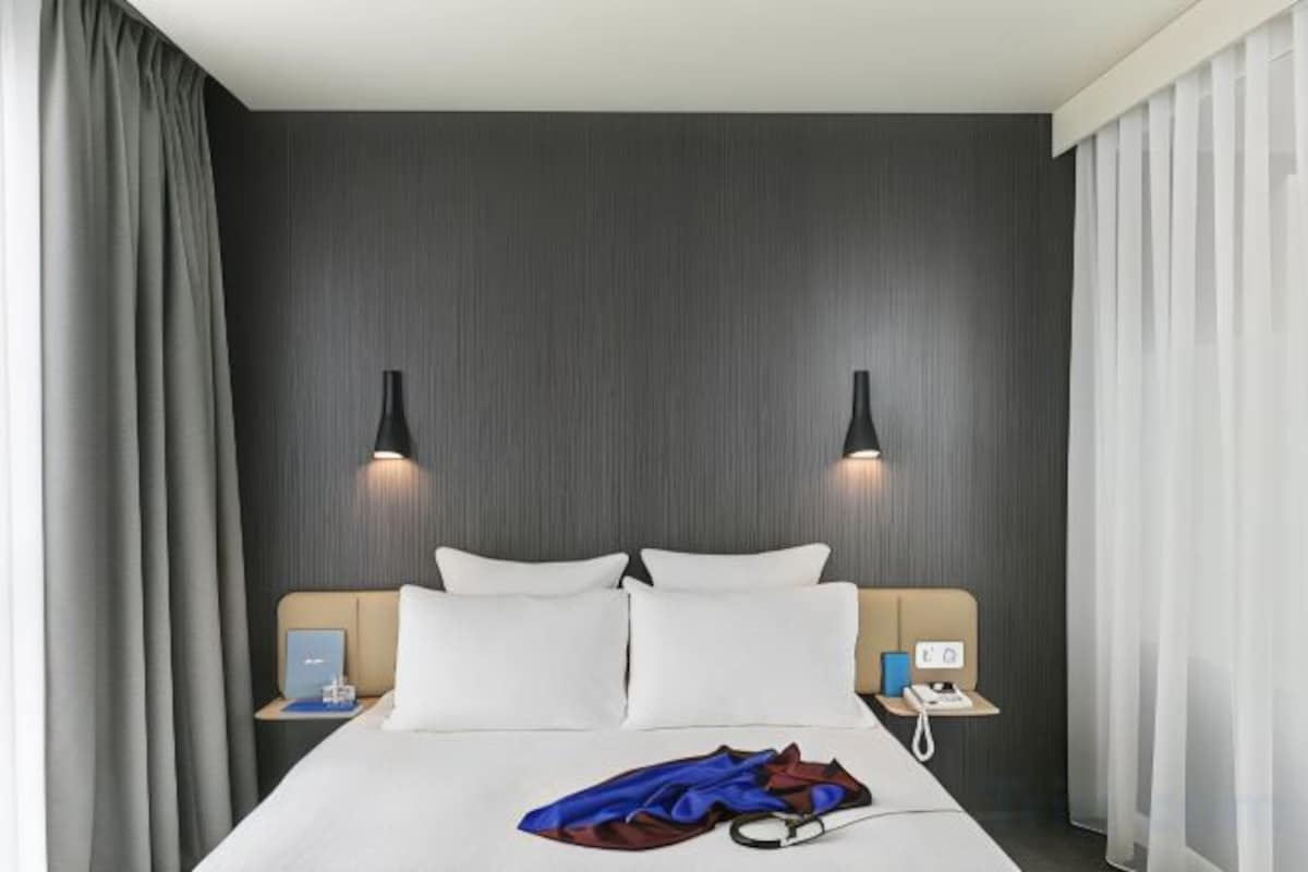 Premium bedding, down comforters, in-room safe, desk