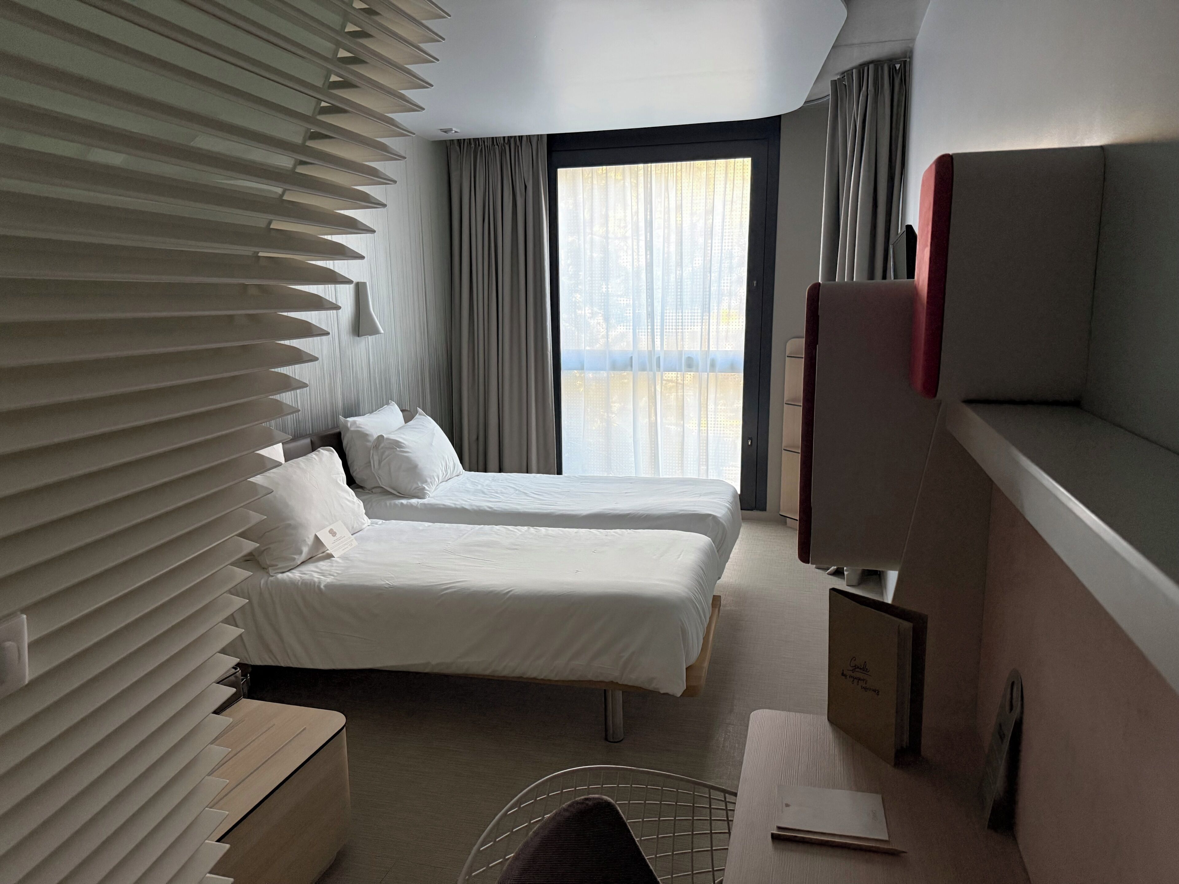 Premium bedding, down comforters, in-room safe, desk