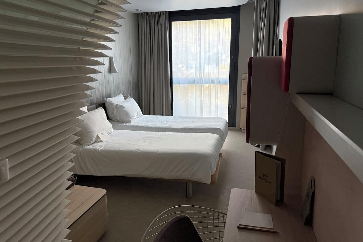 Premium bedding, down comforters, in-room safe, desk