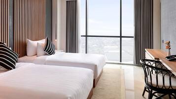 Executive Suite, Multiple Beds | Minibar, desk, laptop workspace, soundproofing