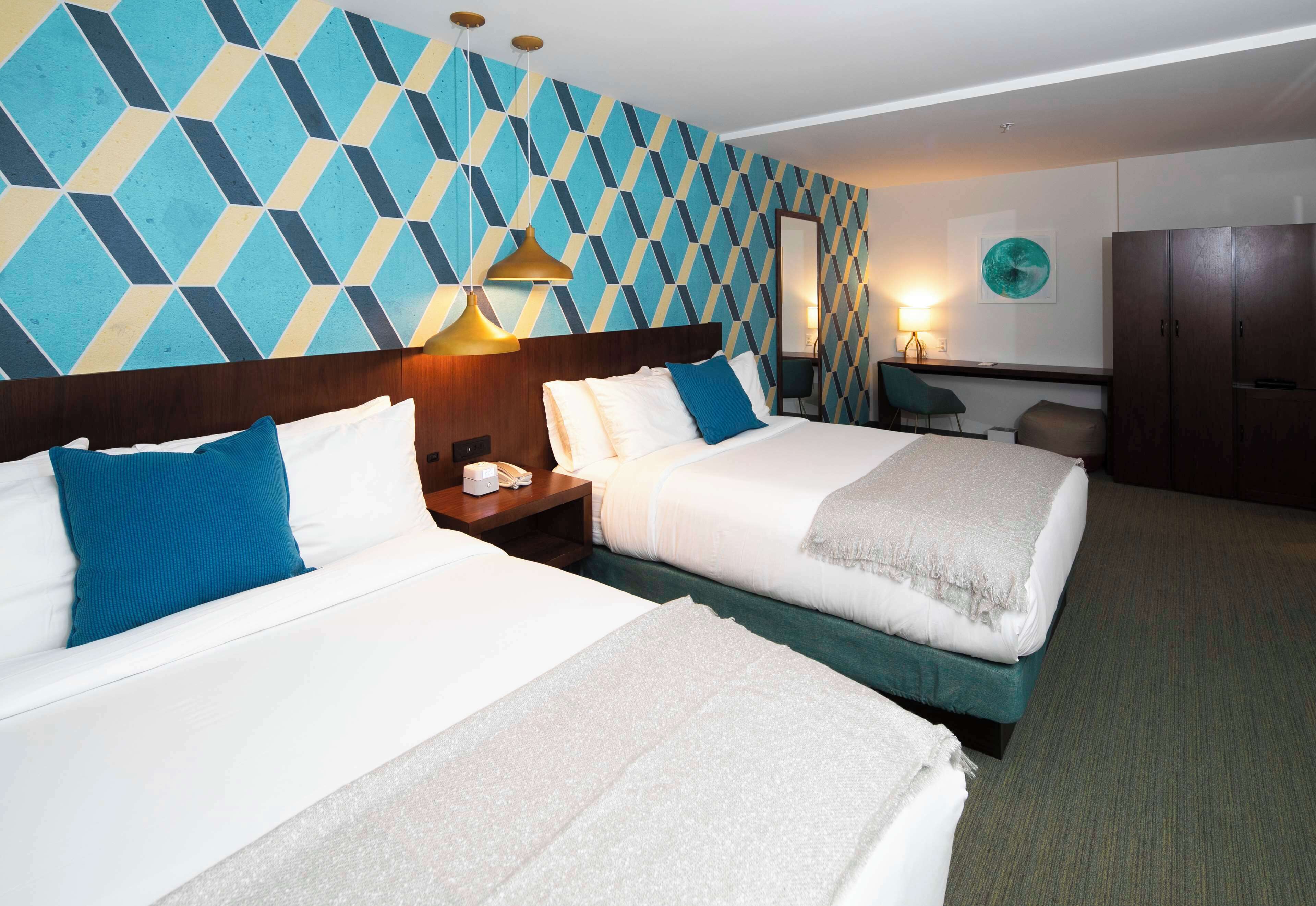 room, 2 queen beds | in-room safe, desk, laptop workspace, iron/ironing board