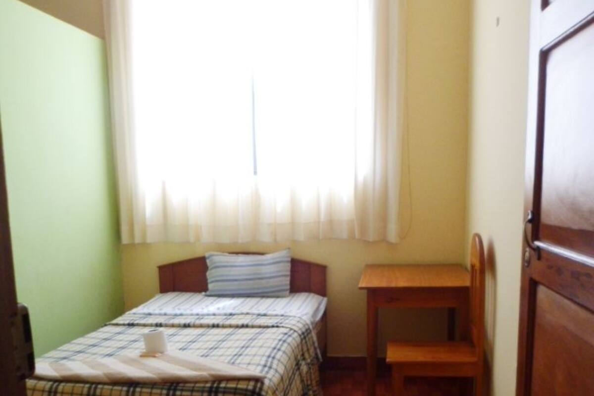 Basic Single Room, City View | Desk, iron/ironing board, free WiFi