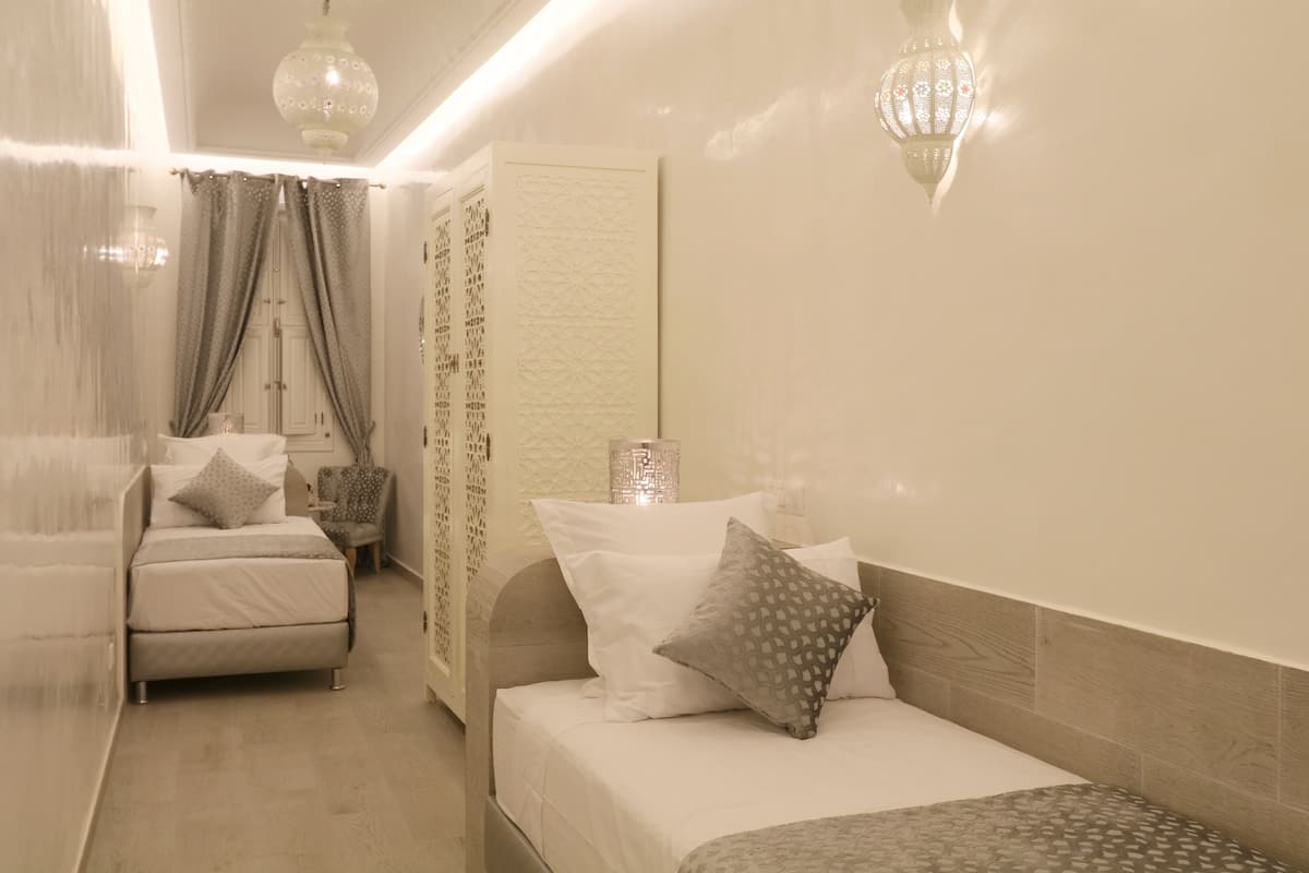 Deluxe Room, 2 Twin Beds | 1 bedroom, premium bedding, in-room safe, individually decorated