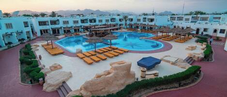 2 outdoor pools, pool umbrellas, sun loungers