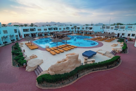 2 outdoor pools, pool umbrellas, sun loungers. Tivoli Hotel Aqua Park