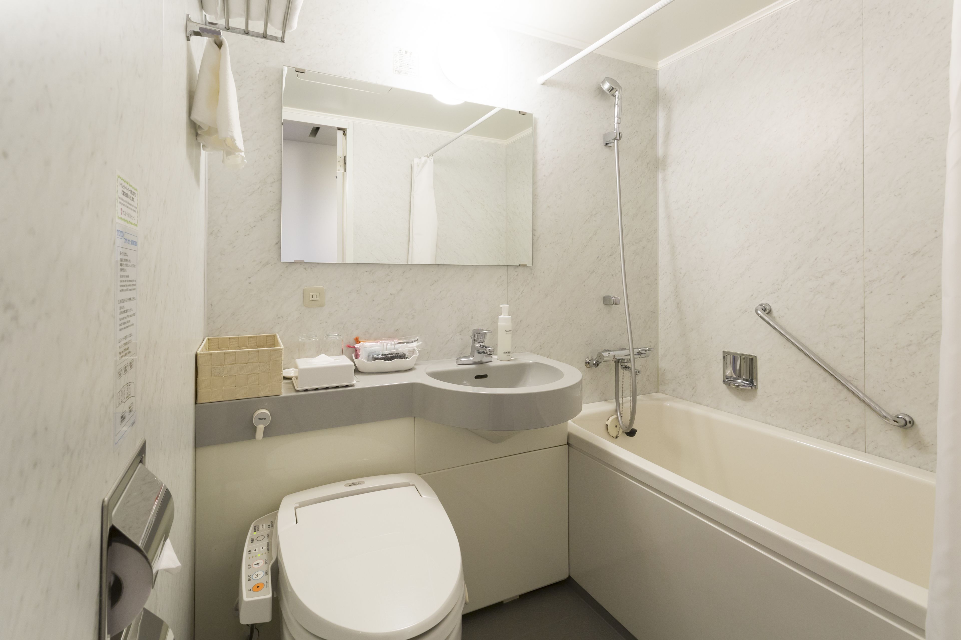 combined shower/bathtub, free toiletries, hair dryer, slippers