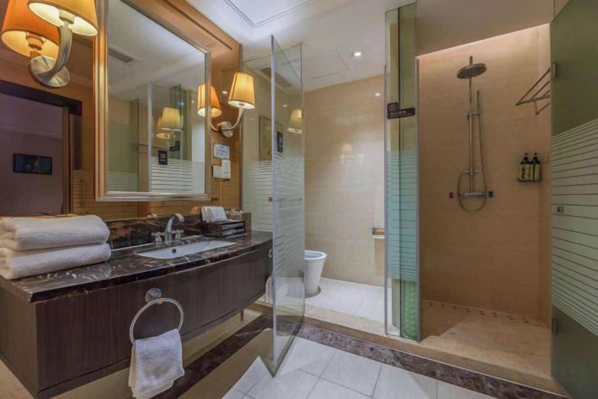 Bathroom | Shower, free toiletries, hair dryer, slippers