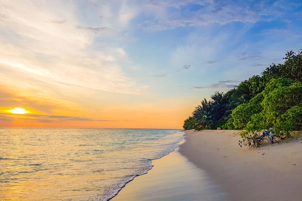 Beach nearby, white sand, sun loungers, beach umbrellas
