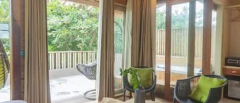Grand Jacuzzi Suite (20% off on Return Shared Speed Boat transfer from Airport) | Coin séjour