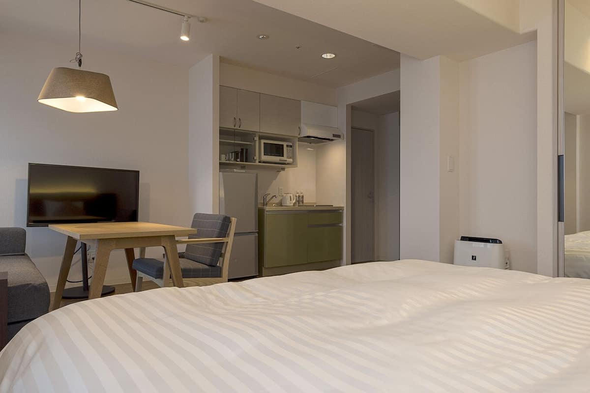 Deluxe-Zimmer, 1 King-Bett und Schlafsofa (B) | Zimmersafe, individuell dekoriert, individuell eingerichtet