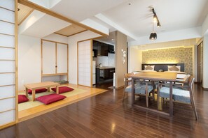 Junior Suite (Japanese Western Style: Bed Size 110cm, Two Beds With Japanese futon, Non-smoking) | Living area | 40-inch flat-screen TV with digital channels, TV, pay movies - Hotel Global View Hakodate (Hakodate)