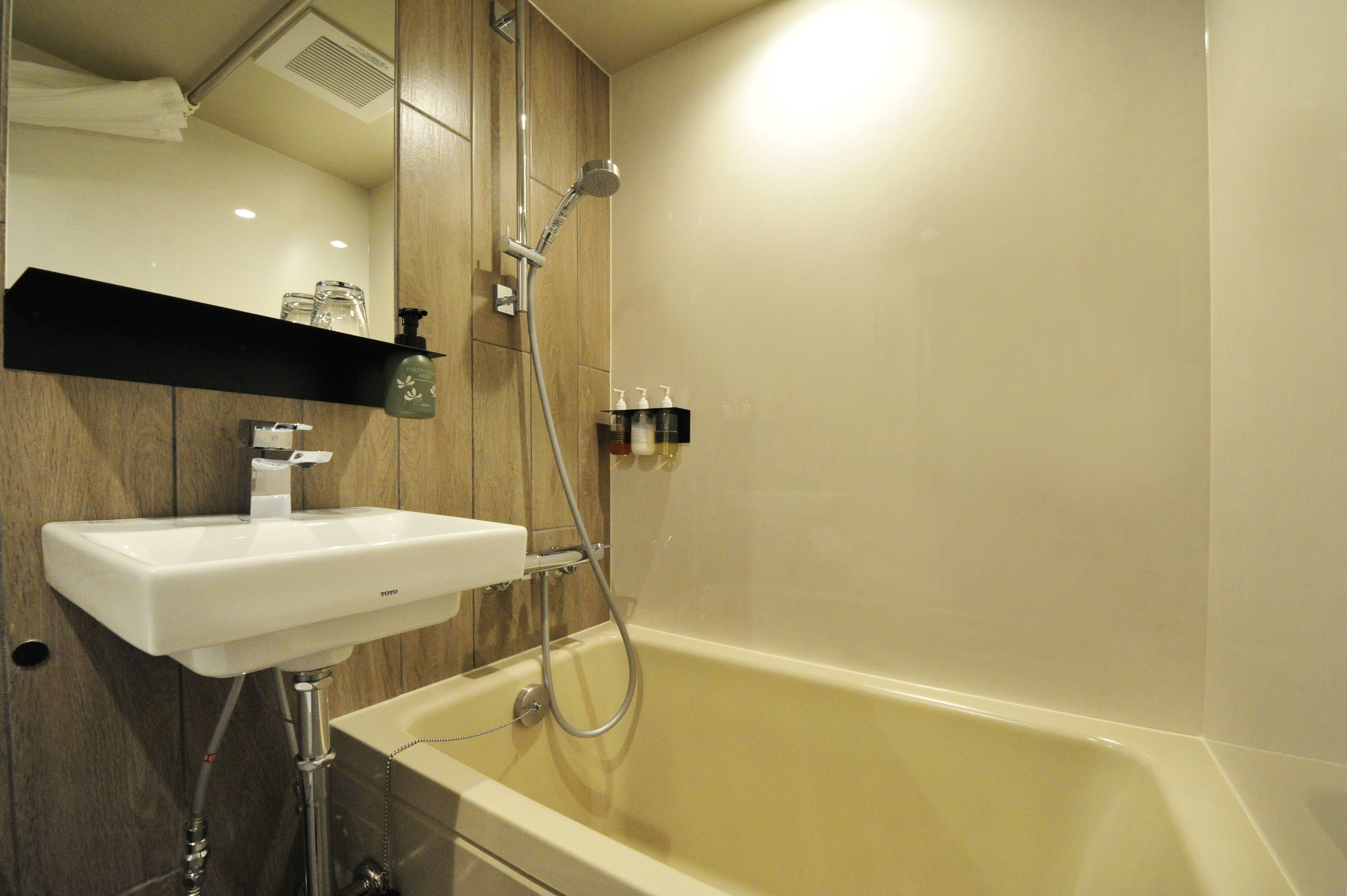 hair dryer, slippers, electronic bidet, towels