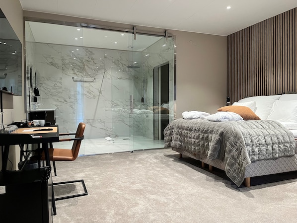 Design Studio Suite | Individually decorated, individually furnished, desk, blackout curtains