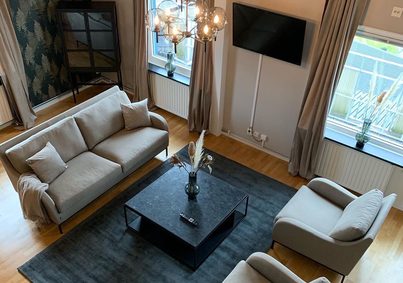 Suíte júnior | Sala de estar | TV de tela plana