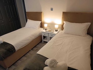 Chambre Standard avec lits jumeaux, salle de bains commune | 1 chambre