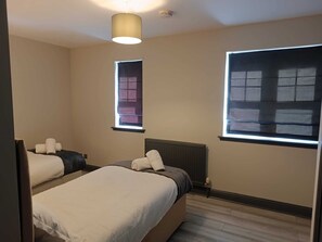 Quarto duplo standard, banheiro compartilhado