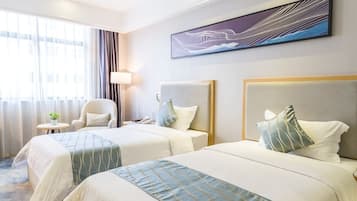 Habitació amb dos llits individuals Deluxe | Sala d'estar | Televisor LCD