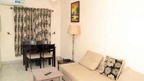 Flat-screen TV - Kudina Luxury Apartments (Abuja)