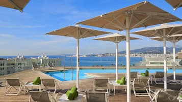 Outdoor pool, pool umbrellas, pool loungers