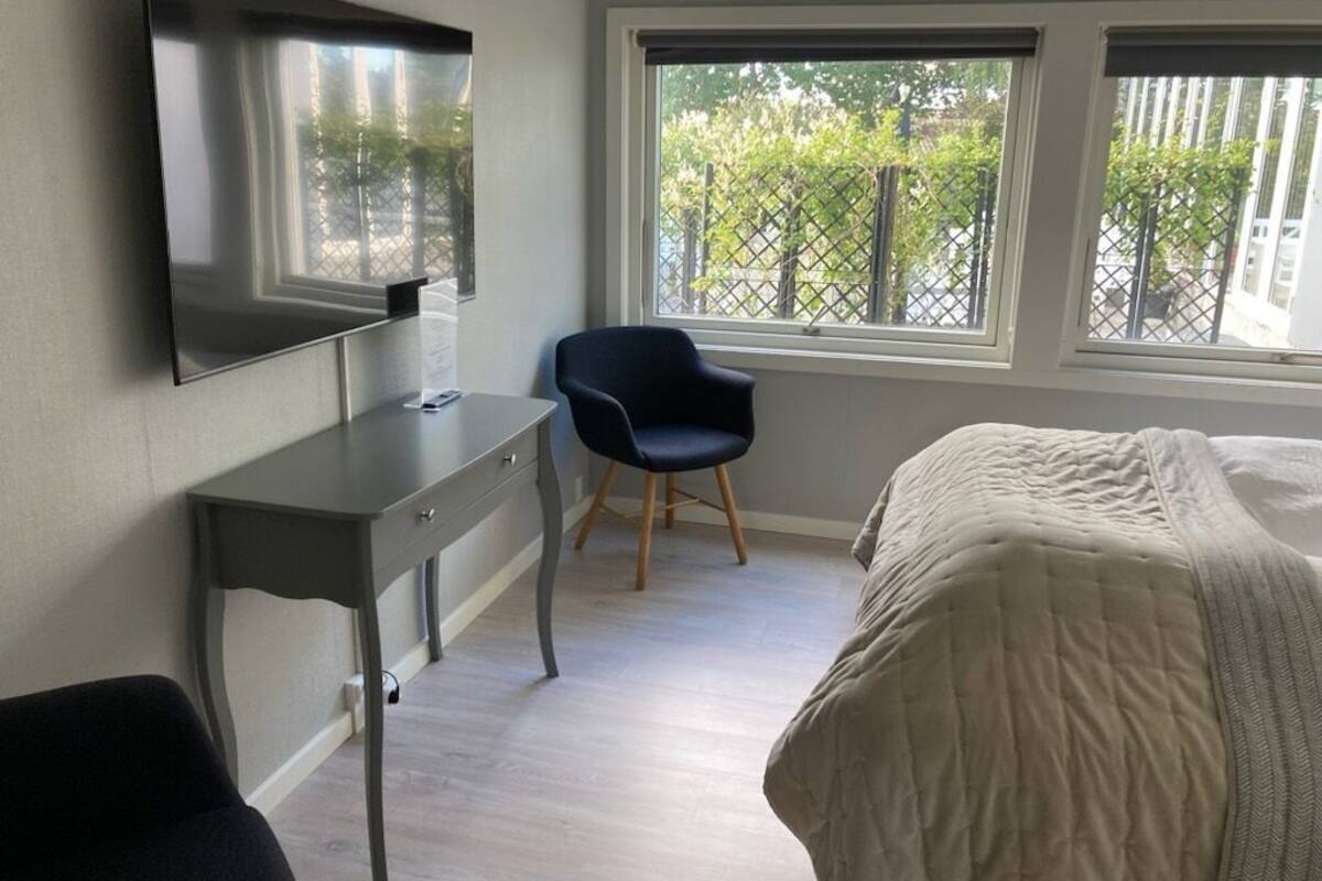 executive double room, 1 king bed | 1 bedroom, desk, laptop workspace, iron/ironing board