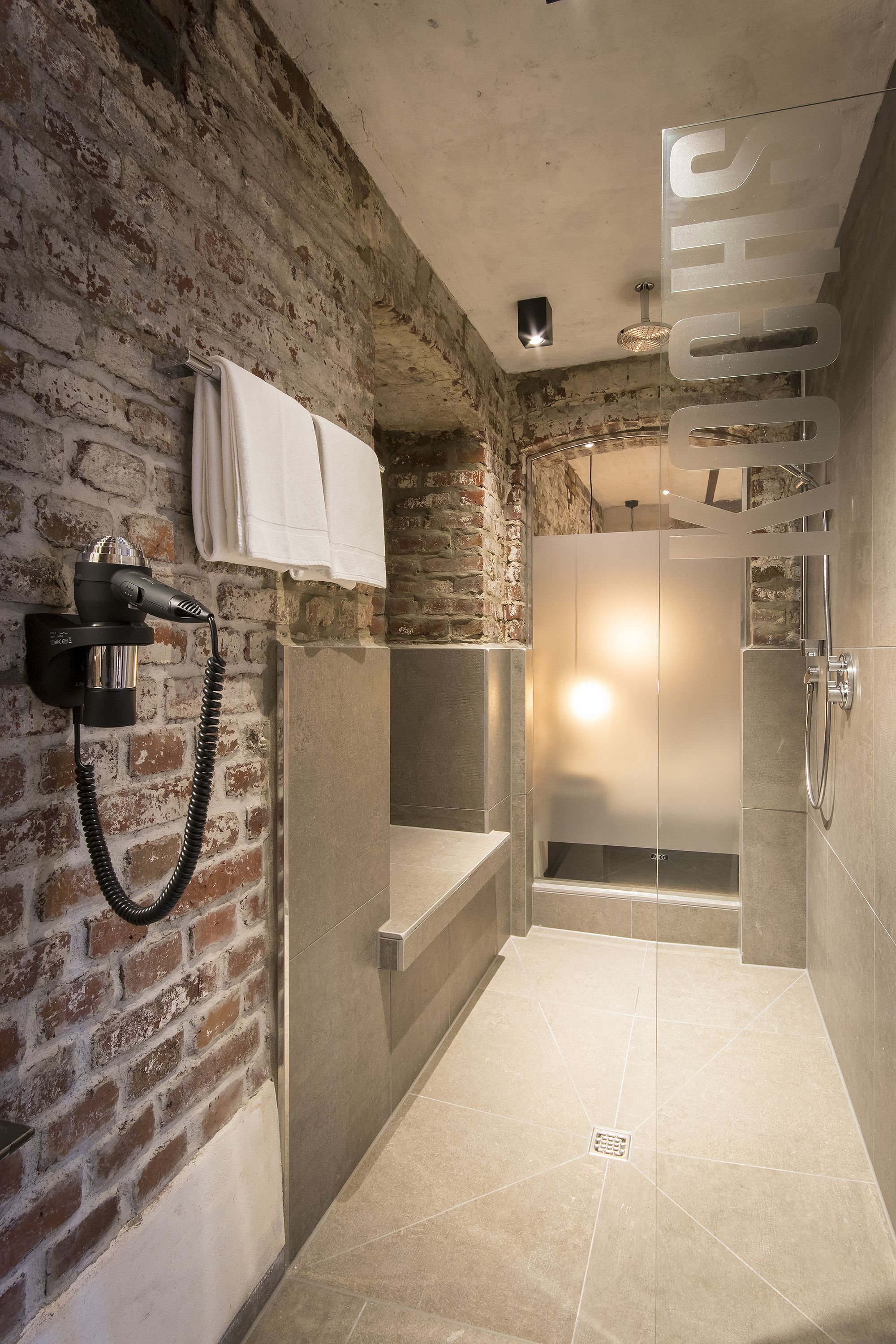 exclusive suite, 1 king bed, non smoking | bathroom | free toiletries, hair dryer, slippers, towels