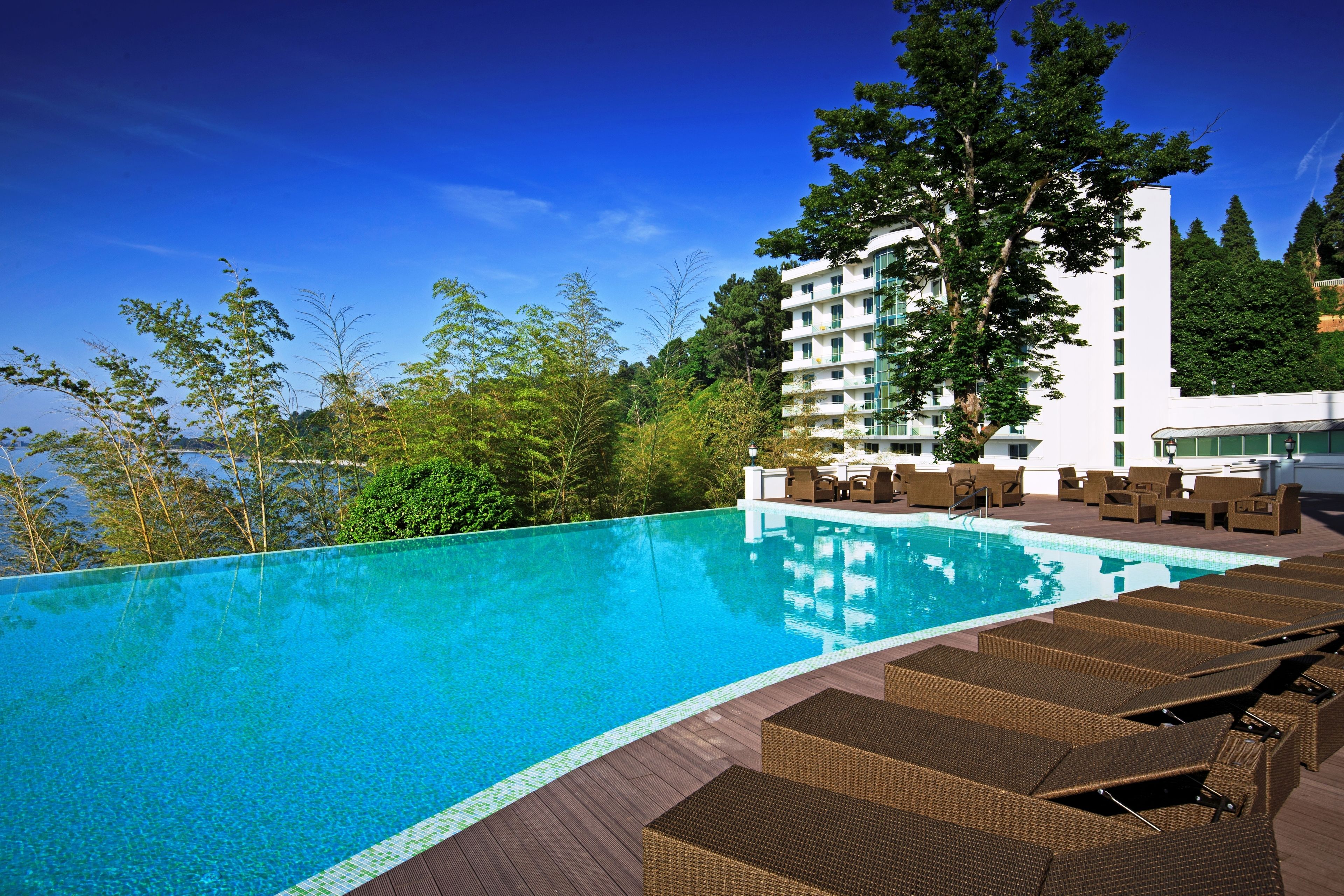 indoor pool, outdoor pool, pool loungers