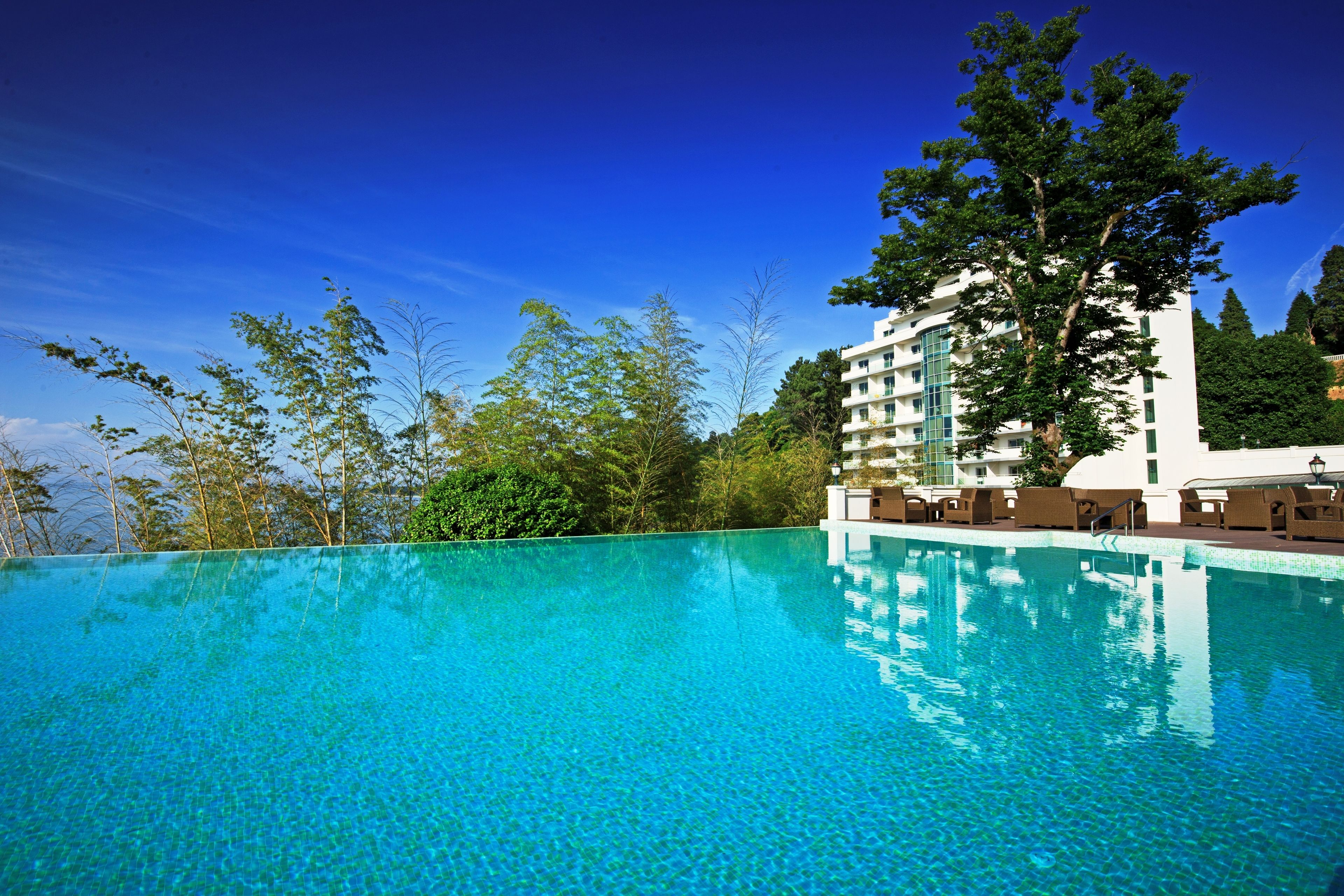 indoor pool, outdoor pool, pool loungers