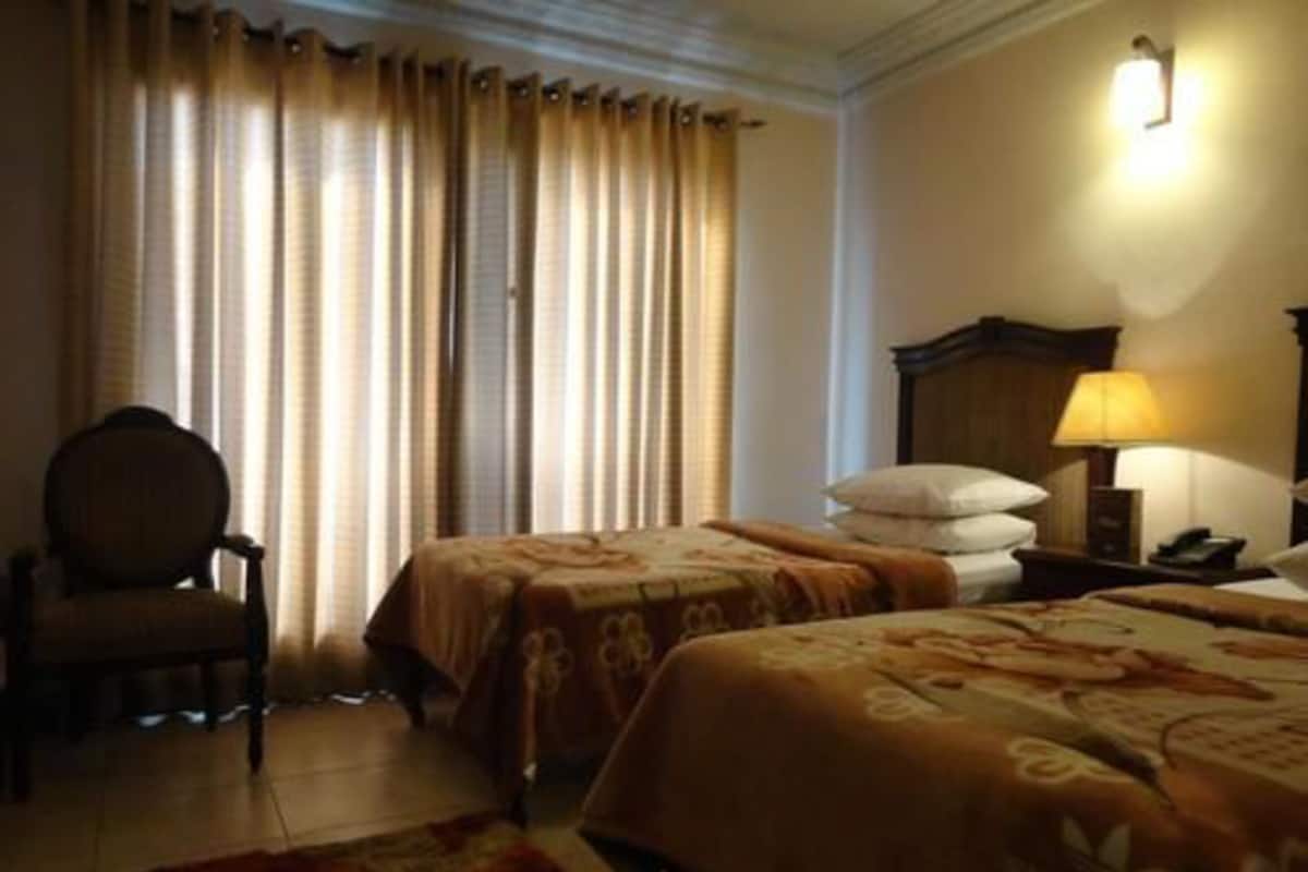 Habitación con 1 cama doble o 2 individuales | Tabla de planchar con plancha y cunas gratuitas