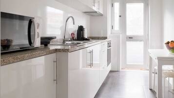 Apartment, 1 Bedroom | Private kitchen | Fridge, microwave, stovetop, espresso maker