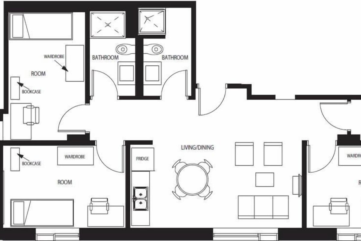 A floor plan of a hotel with two bedrooms, two bathrooms, a living/dining area, a kitchen, a fridge, and a storage area.