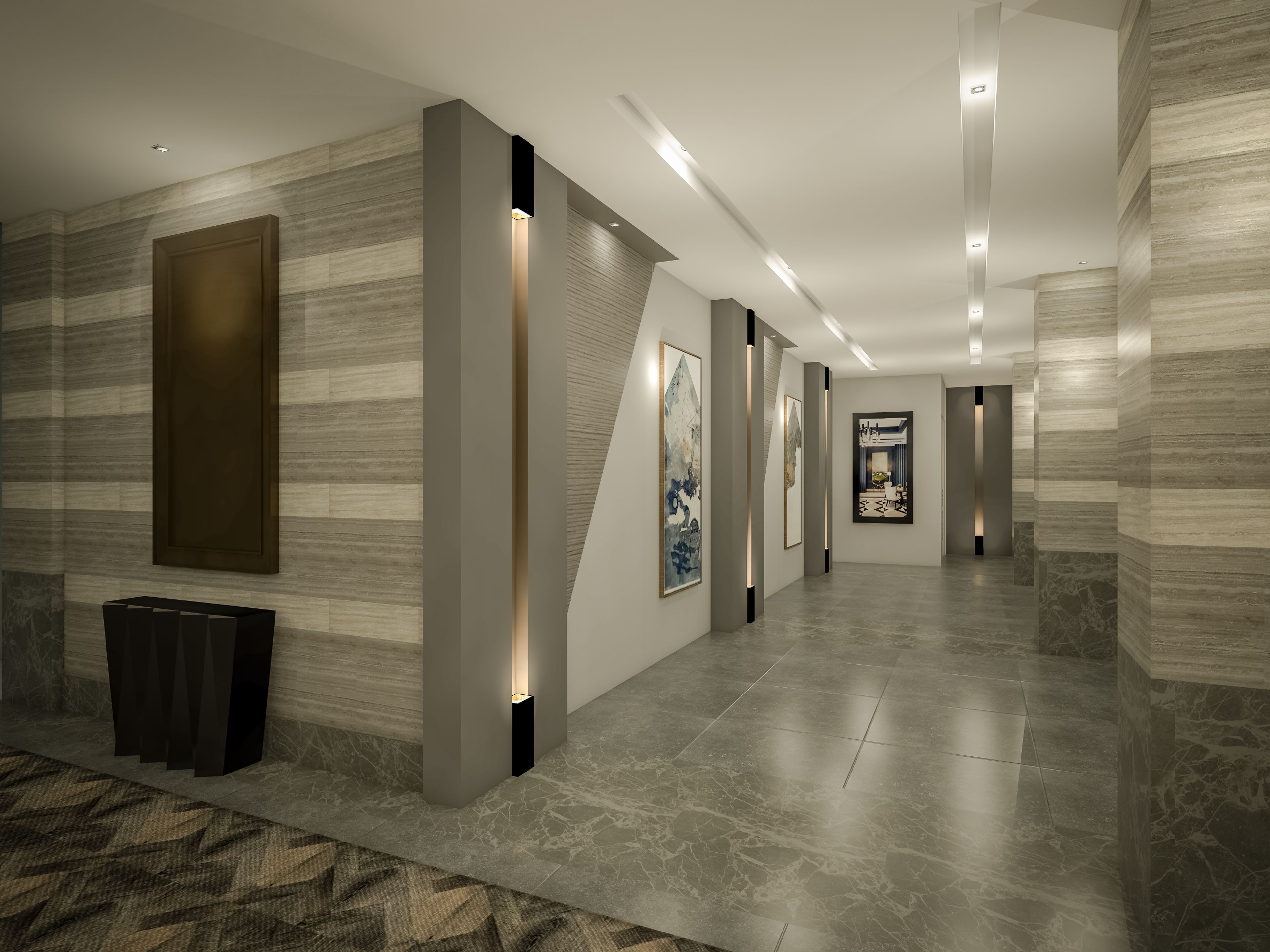 A modern hallway with marble flooring, recessed lighting, and framed artwork on the walls.