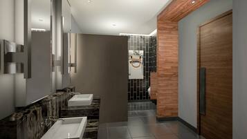 A modern bathroom with two sinks, a wooden accent wall, and a tiled floor.
