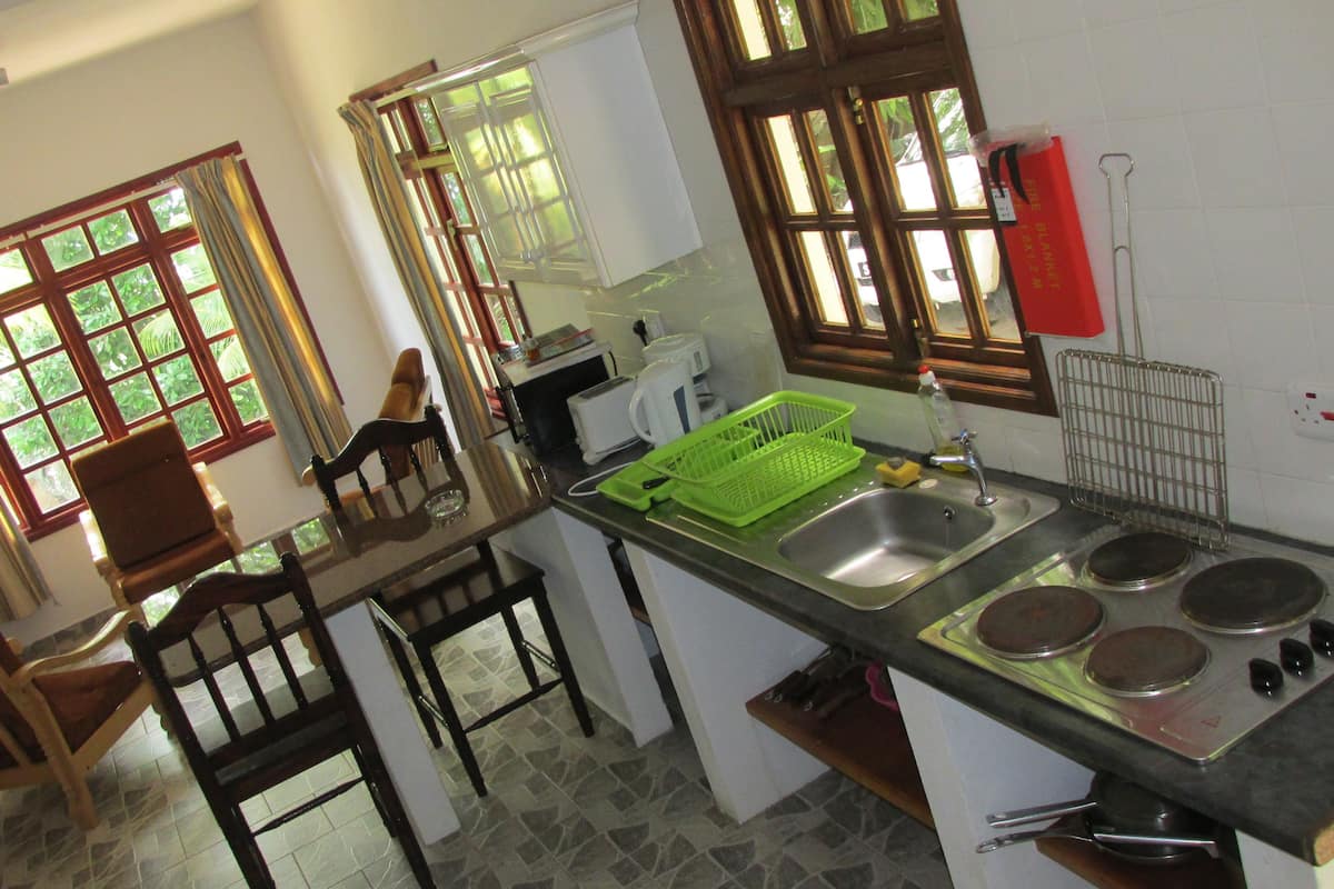 Apartment, 1 Bedroom | Private kitchen | Coffee/tea maker, fridge, electric kettle, cookware/dishes/utensils