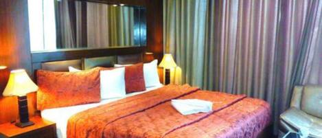 Suite ejecutiva | Área de sala de estar | Televisión LCD